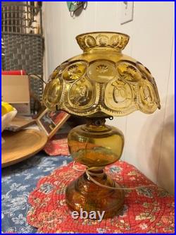 LE Smith electric lamp amber/yellow in color LE Smith electric lamp amber/yellow in color