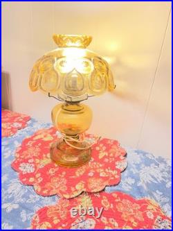 LE Smith electric lamp amber/yellow in color LE Smith electric lamp amber/yellow in color
