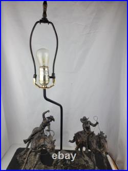 Vintage Cattle Ranchers Cowboys Lazoing A Wild Horse Wooden Base Table Lamp
