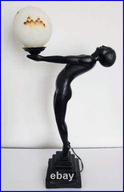 Vintage Max Le Verrier Reproduction Art Deco Female Sculpture Holding Globe Lamp Vintage Max Le Verrier Reproduction Art Deco Female Sculpture Holding Globe Lamp