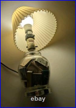 Vintage glass apothecary table lamp with matchbooks inside
