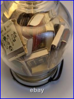 Vintage glass apothecary table lamp with matchbooks inside Vintage glass apothecary table lamp with matchbooks inside