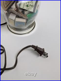 Vintage glass apothecary table lamp with matchbooks inside