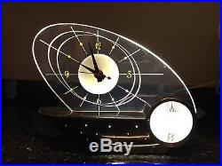 Vintage mid century modern Atomic Eames Clock Lamp